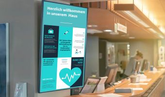 Lobbymonitor mit Willkommensgruß