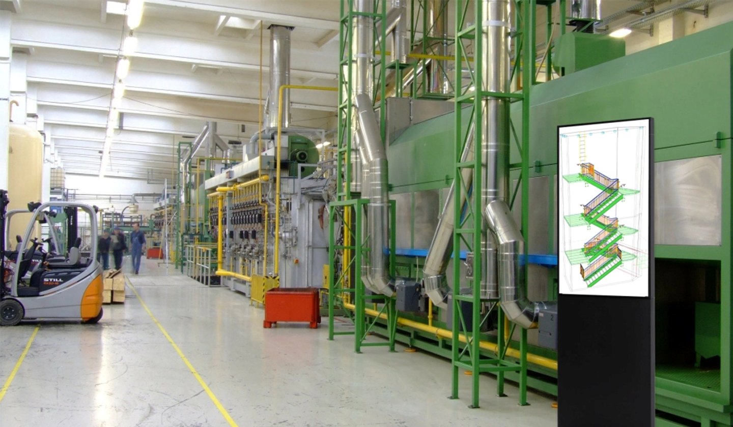 Elektronische Stele mit Wegeleitsystem in Fabrikhalle