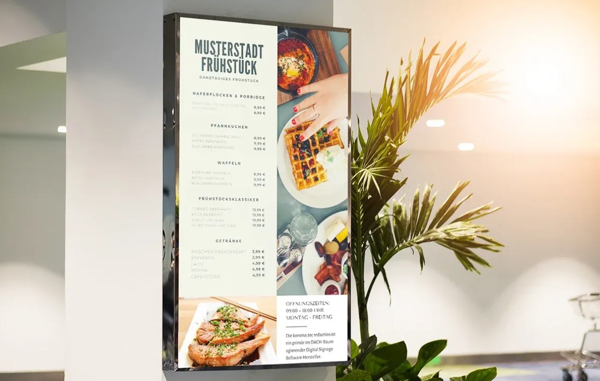 Ein digitaler Menübildschirm in einem modernen Innenbereich, der das Frühstücksangebot eines Restaurants mit Preisen anzeigt.